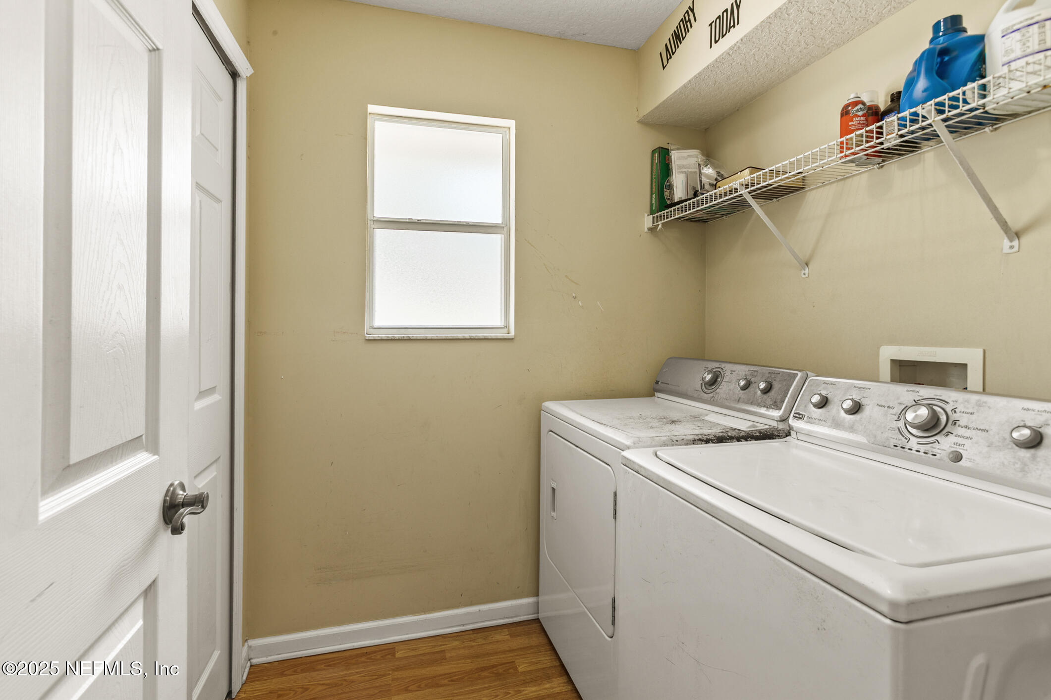 85 Murray Street North Baldwin, FL 32234 - Photo 33 of 49 a utility room with dryer and washer