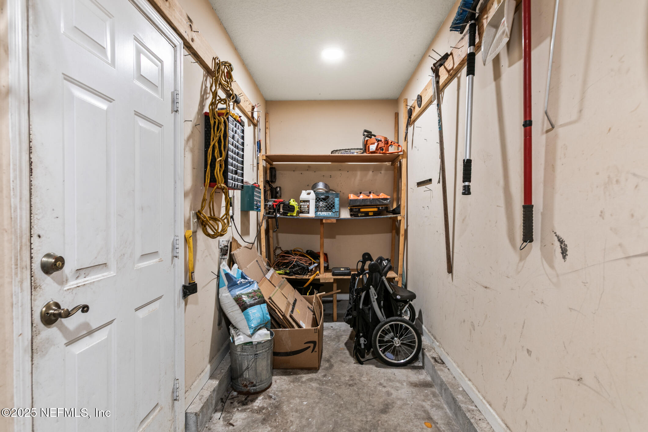 85 Murray Street North Baldwin, FL 32234 - Photo 40 of 49 a view of a storage room