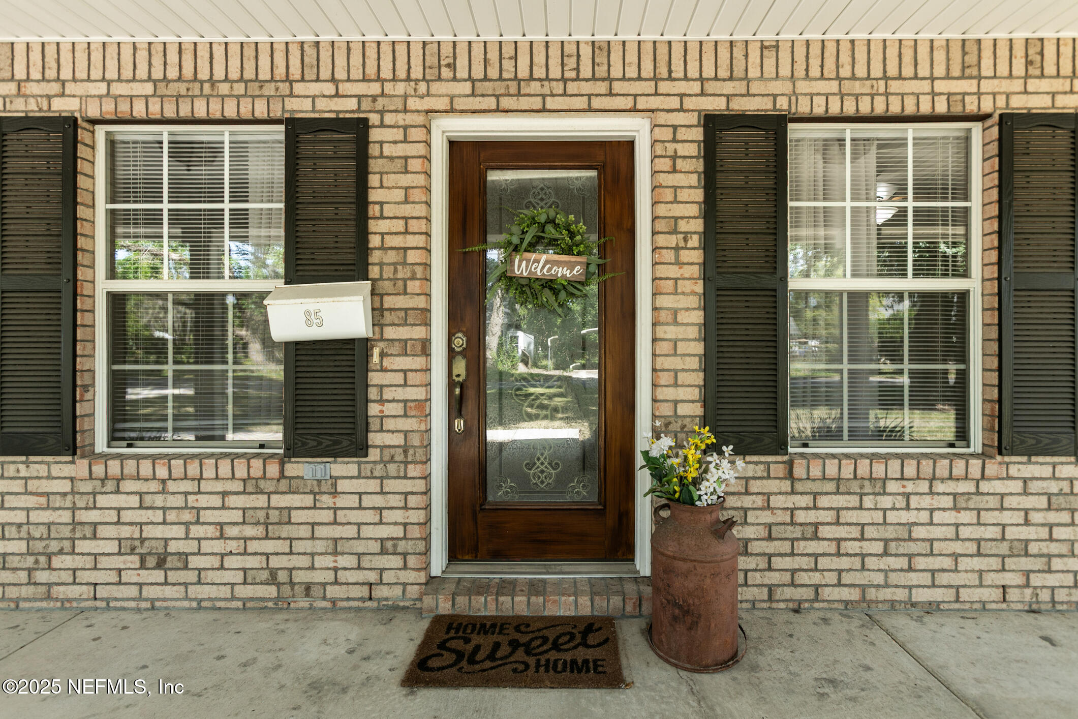 85 Murray Street North Baldwin, FL 32234 - Photo 6 of 49 a front view of a house