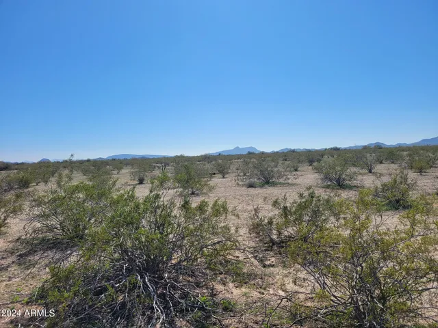 a view of an outdoor space and a mountain view