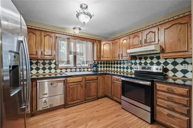 $575,000 | 54 Sherwood Drive, Westerly, RI 02891