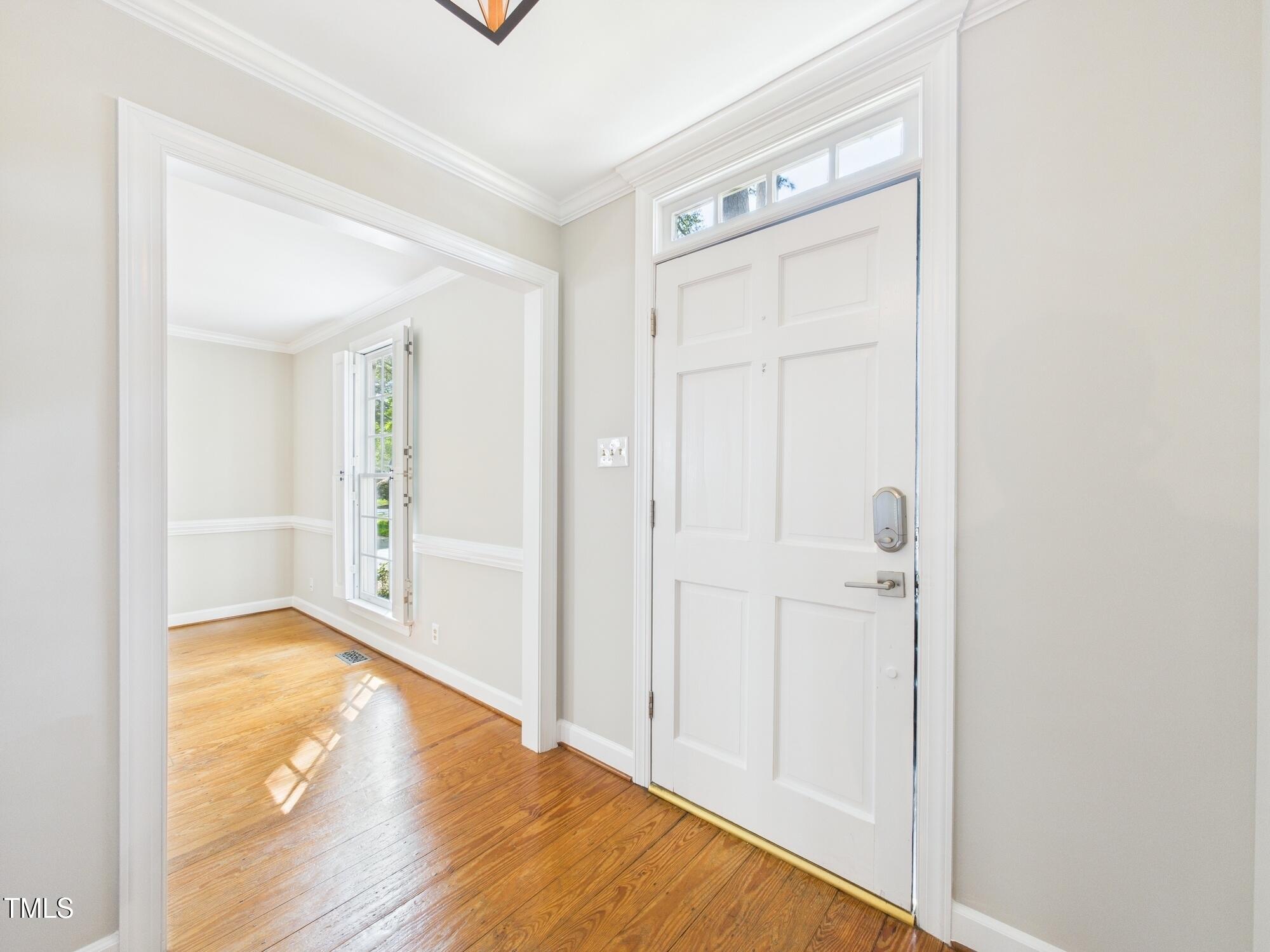 7117 Sandringham Drive Raleigh, NC 27613 - Photo 11 of 54 a view of an empty room