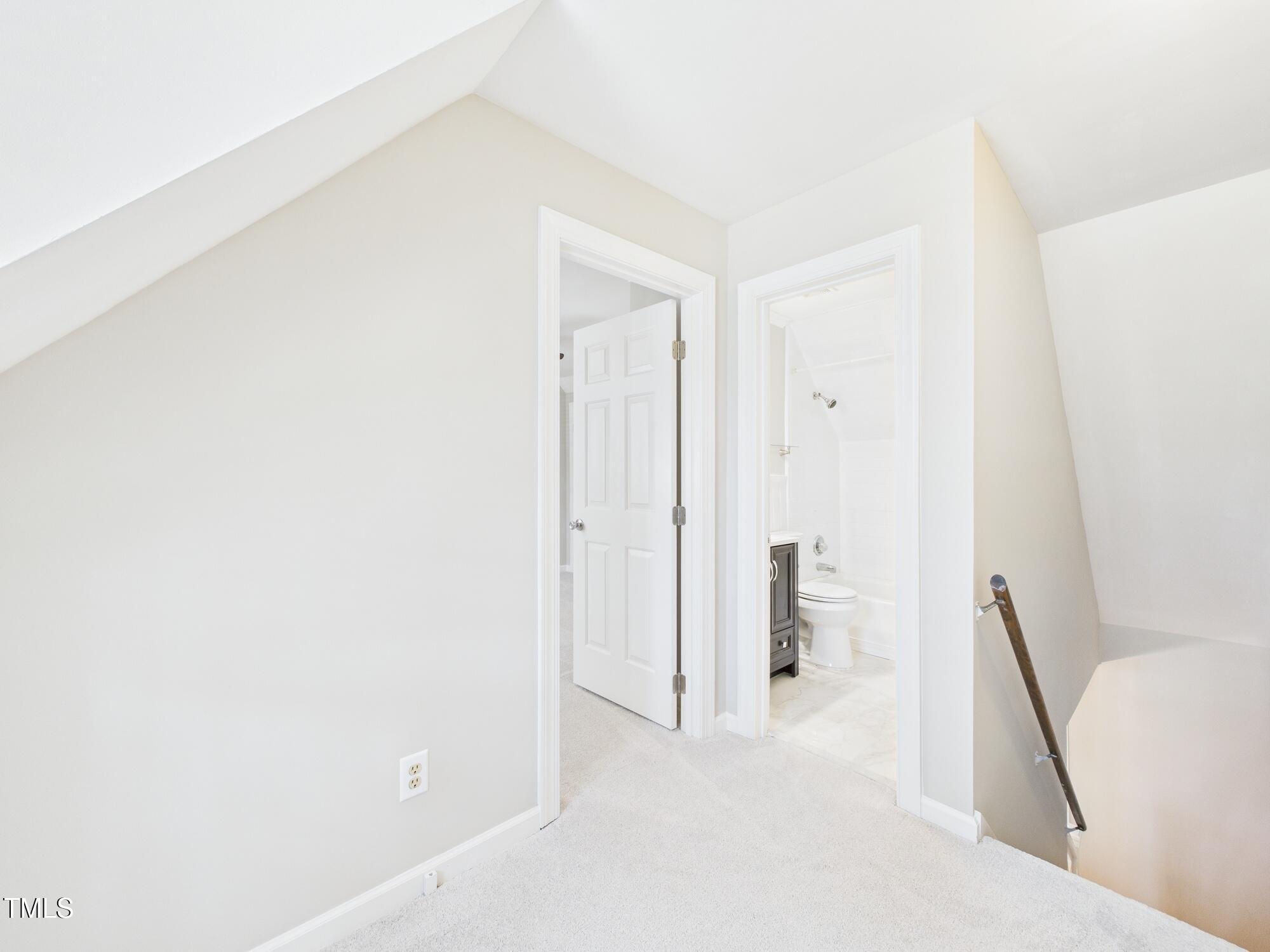 7117 Sandringham Drive Raleigh, NC 27613 - Photo 32 of 54 a view of an empty room and bathroom