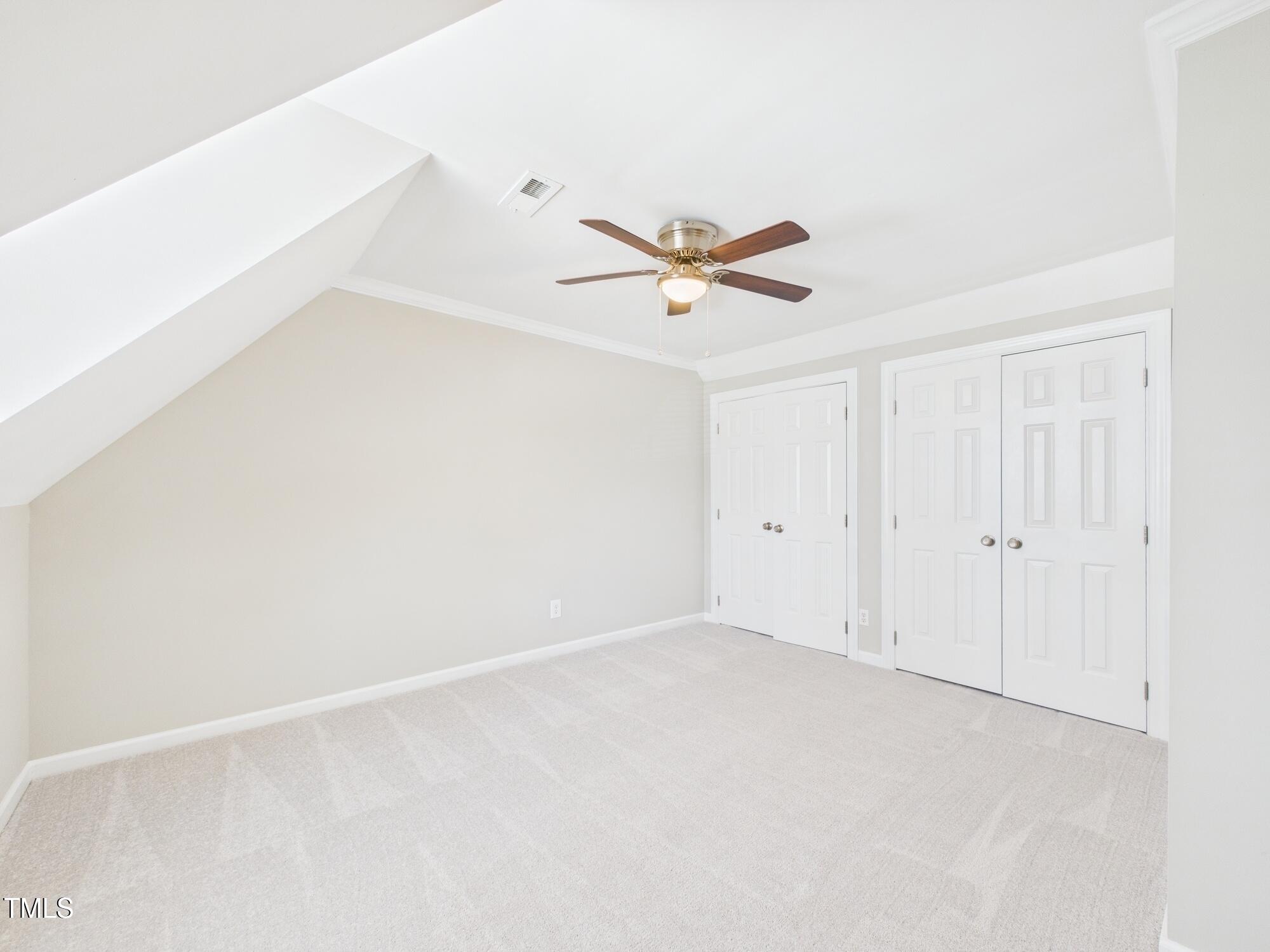 7117 Sandringham Drive Raleigh, NC 27613 - Photo 35 of 54 a view of an empty room