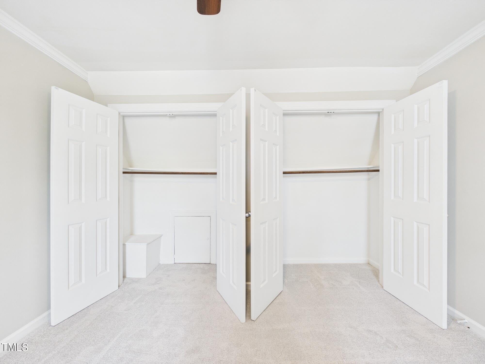 7117 Sandringham Drive Raleigh, NC 27613 - Photo 43 of 54 a view of a room with a refrigerator