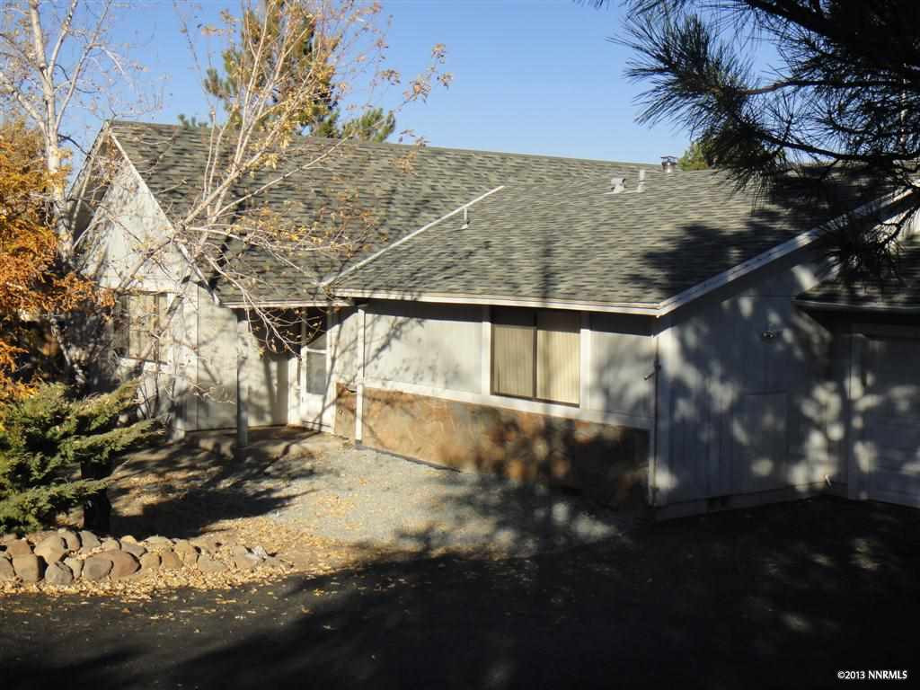 12760 Thomas Creek Road Reno, NV 89511 - Photo 1 of 1 a view of a yard with a tree