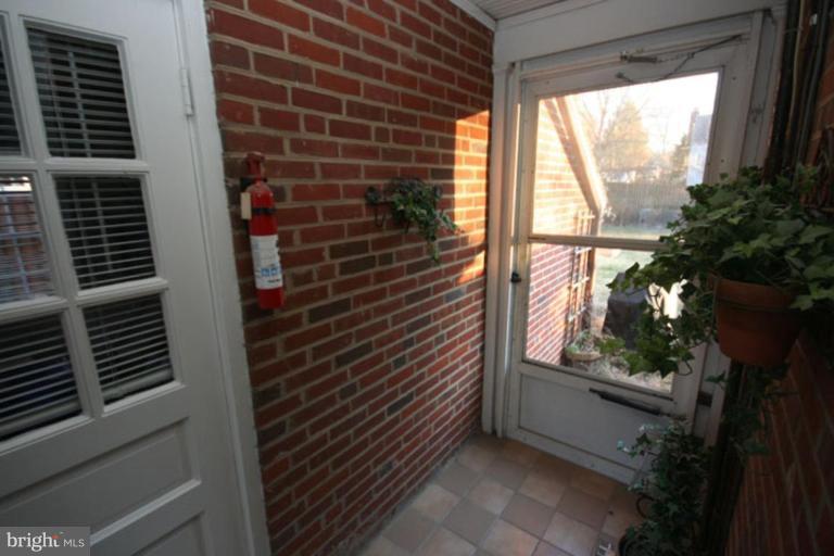 12 Stockton Road Silver Spring, MD 20901 - Photo 25 of 30 Enclosed Breezeway between garage and kitchen