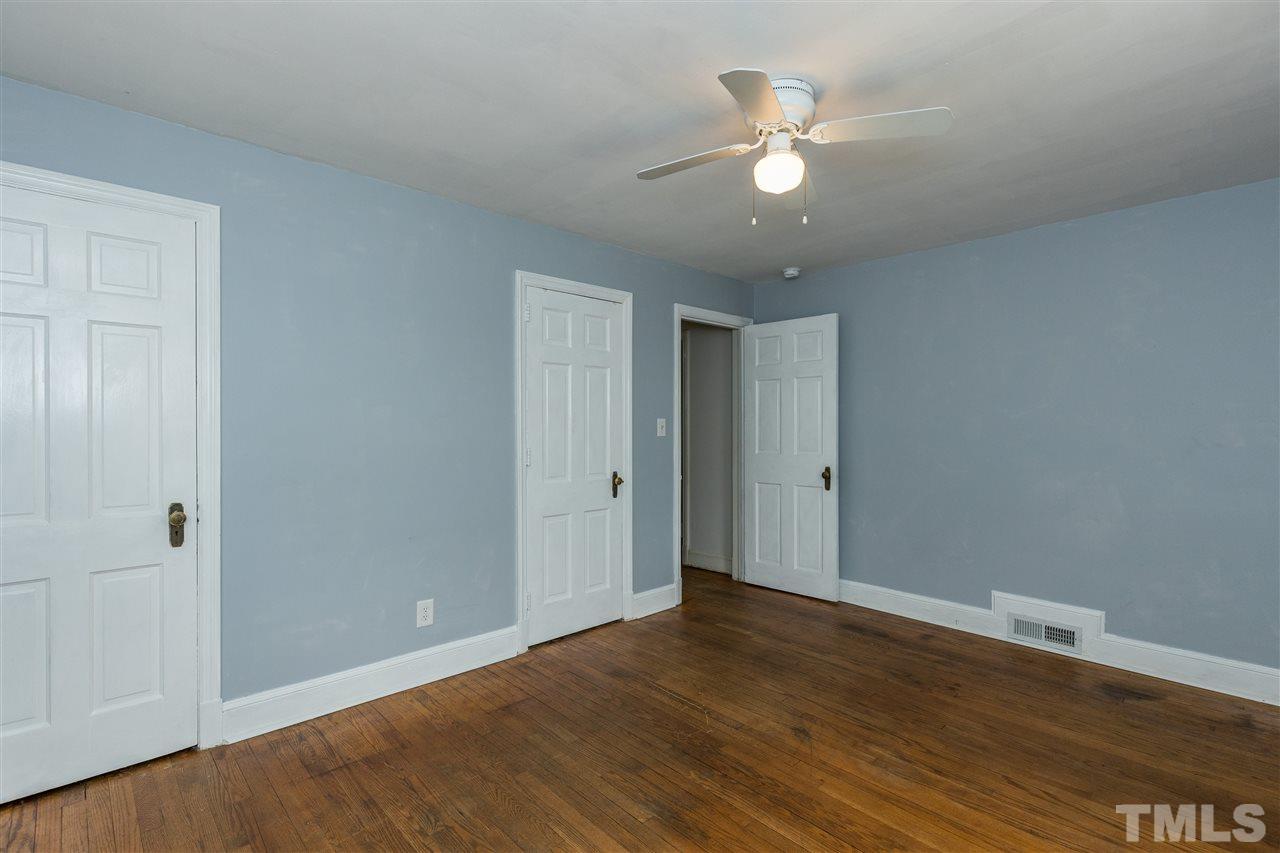 614 Elm Street Raleigh, NC 27604 - Photo 18 of 30 a view of an empty room with wooden floor