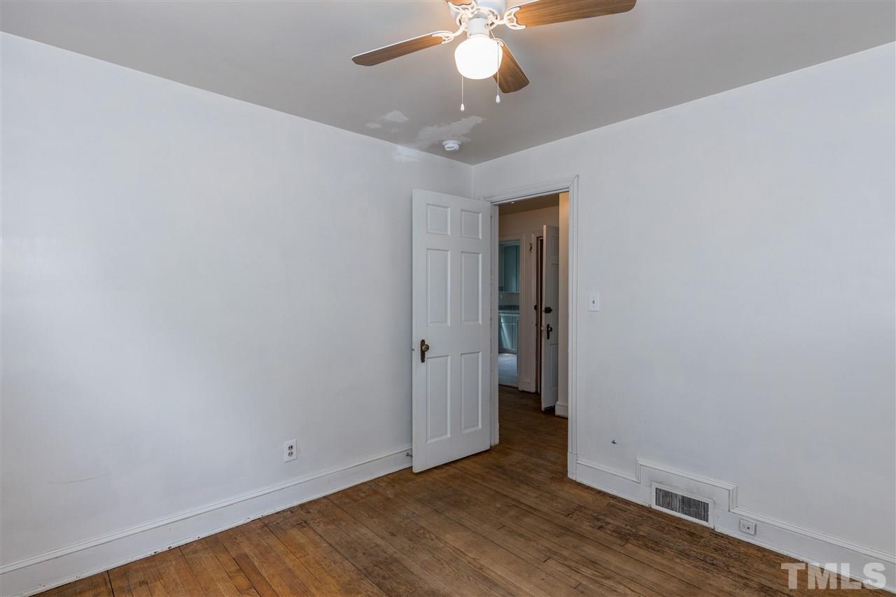 614 Elm Street Raleigh, NC 27604 - Photo 20 of 30 a view of an empty room with wooden floor