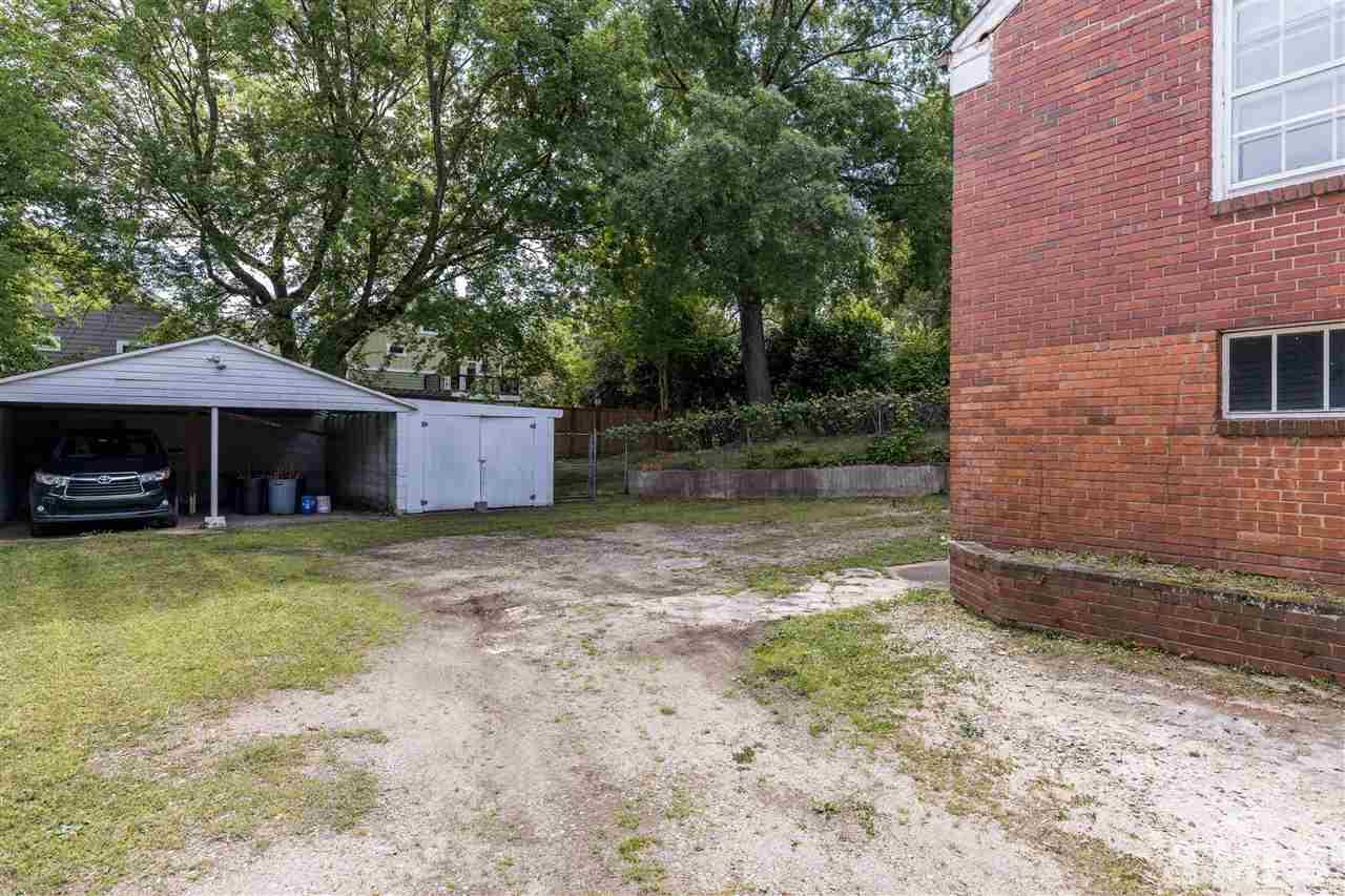 614 Elm Street Raleigh, NC 27604 - Photo 28 of 30 a backyard of a house with barbeque oven