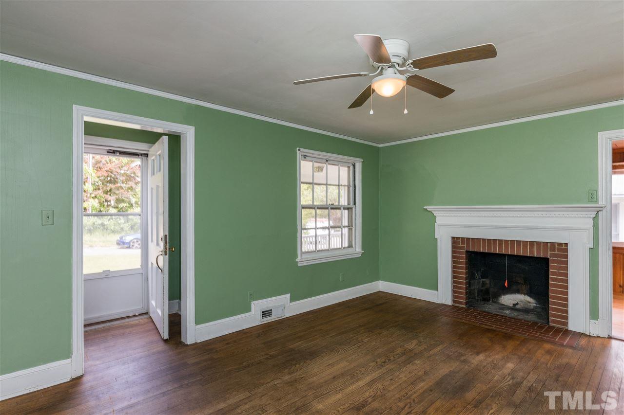 614 Elm Street Raleigh, NC 27604 - Photo 7 of 30 a view of an empty room with window and wooden floor