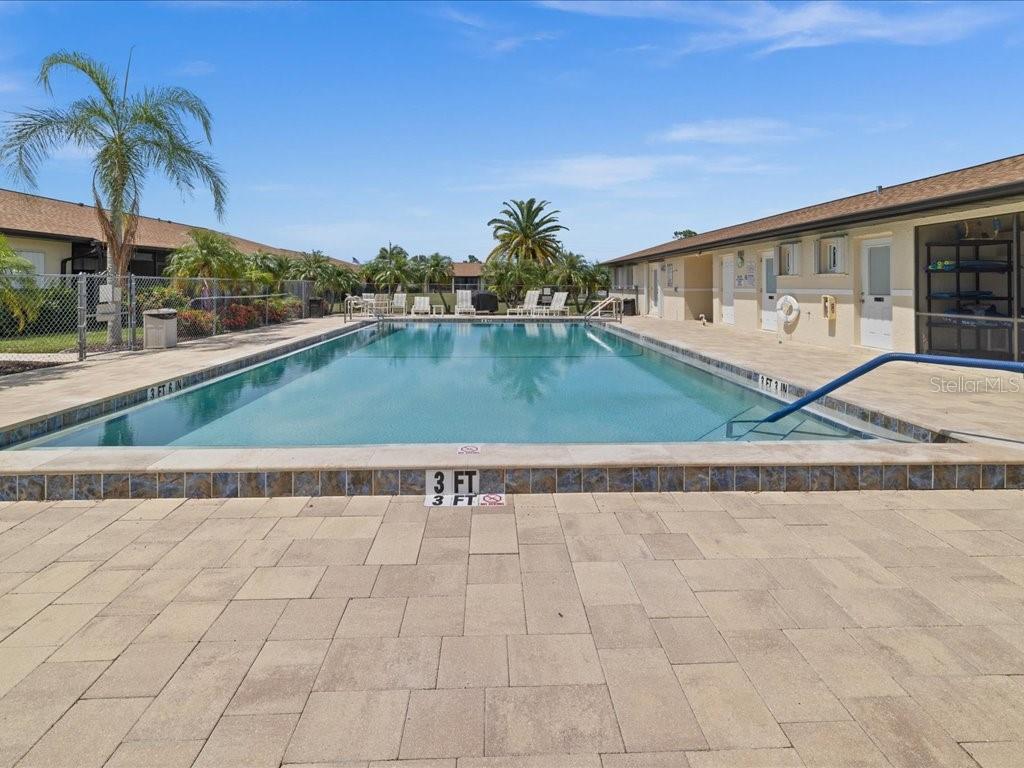 25275 Rampart Boulevard, Unit 1607 Punta Gorda, FL 33983 - Photo 19 of 23 a view of a house with a swimming pool