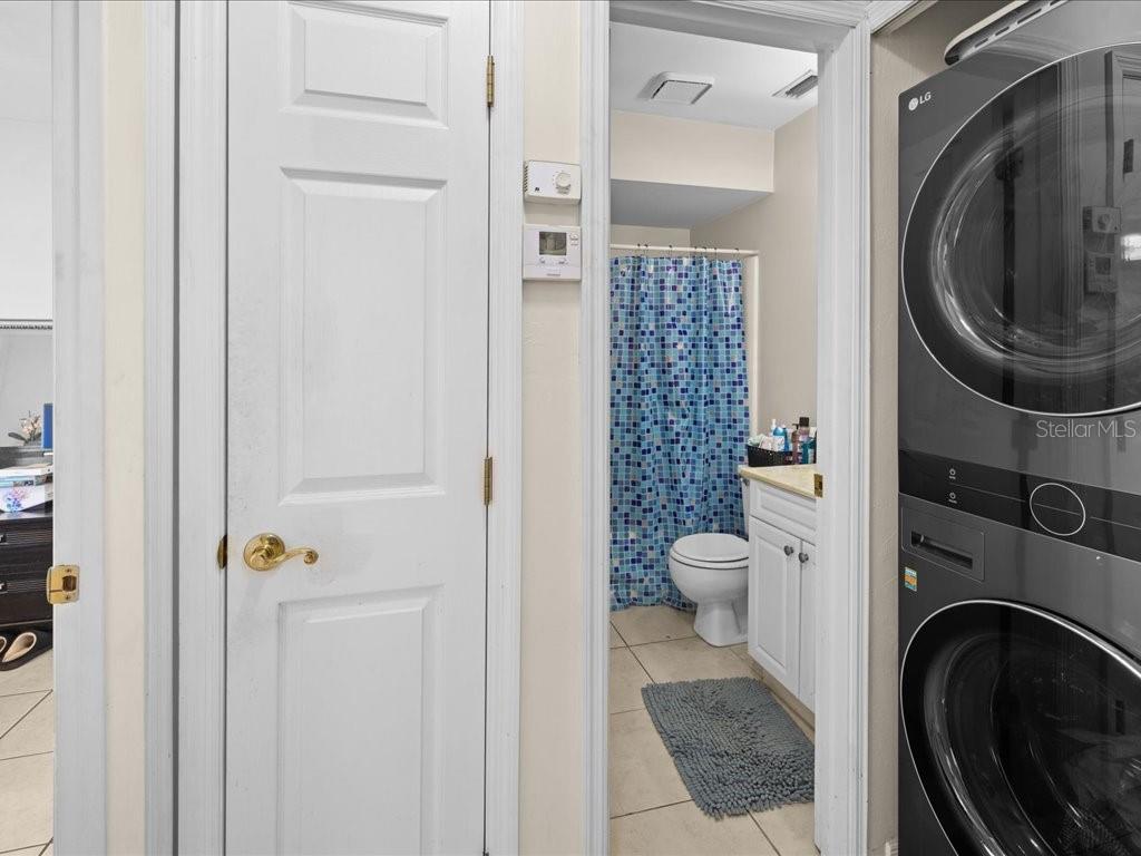 25275 Rampart Boulevard, Unit 1607 Punta Gorda, FL 33983 - Photo 10 of 23 a bathroom with a toilet and a shower