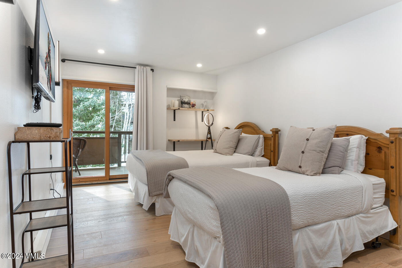 1650 Fall Ridge Road, Unit 401 Vail, CO 81657 - Photo 18 of 29 a bed room with a bed and a large window