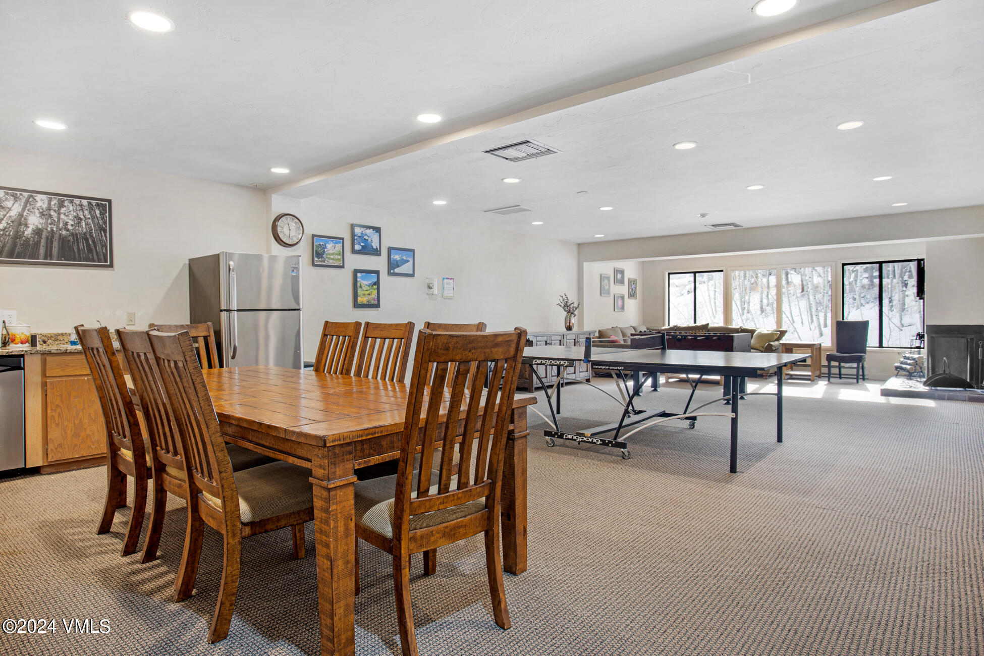 1650 Fall Ridge Road, Unit 401 Vail, CO 81657 - Photo 24 of 29 a view of a dining room with furniture and a livingroom