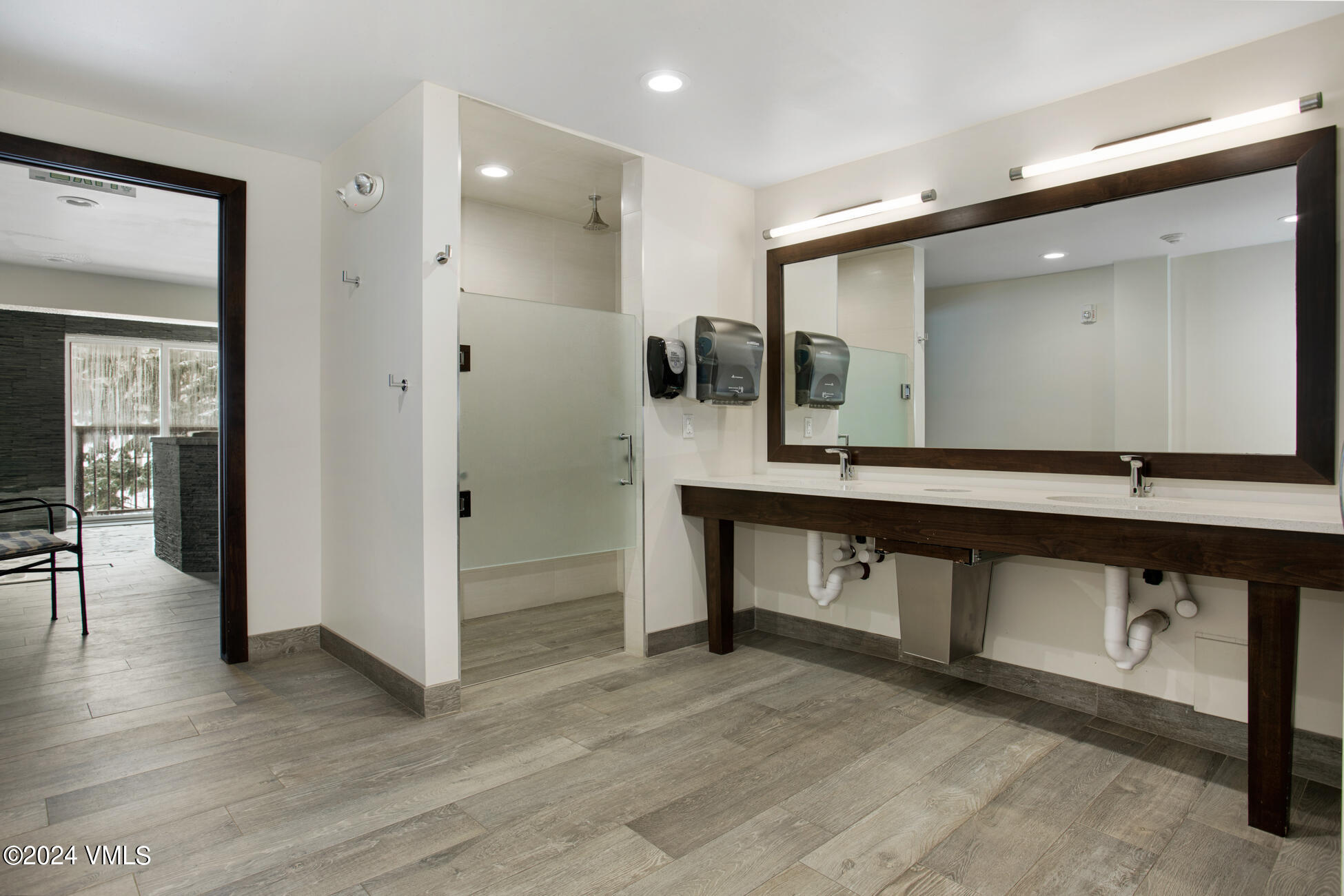 1650 Fall Ridge Road, Unit 401 Vail, CO 81657 - Photo 27 of 29 a bathroom with a sink and a mirror