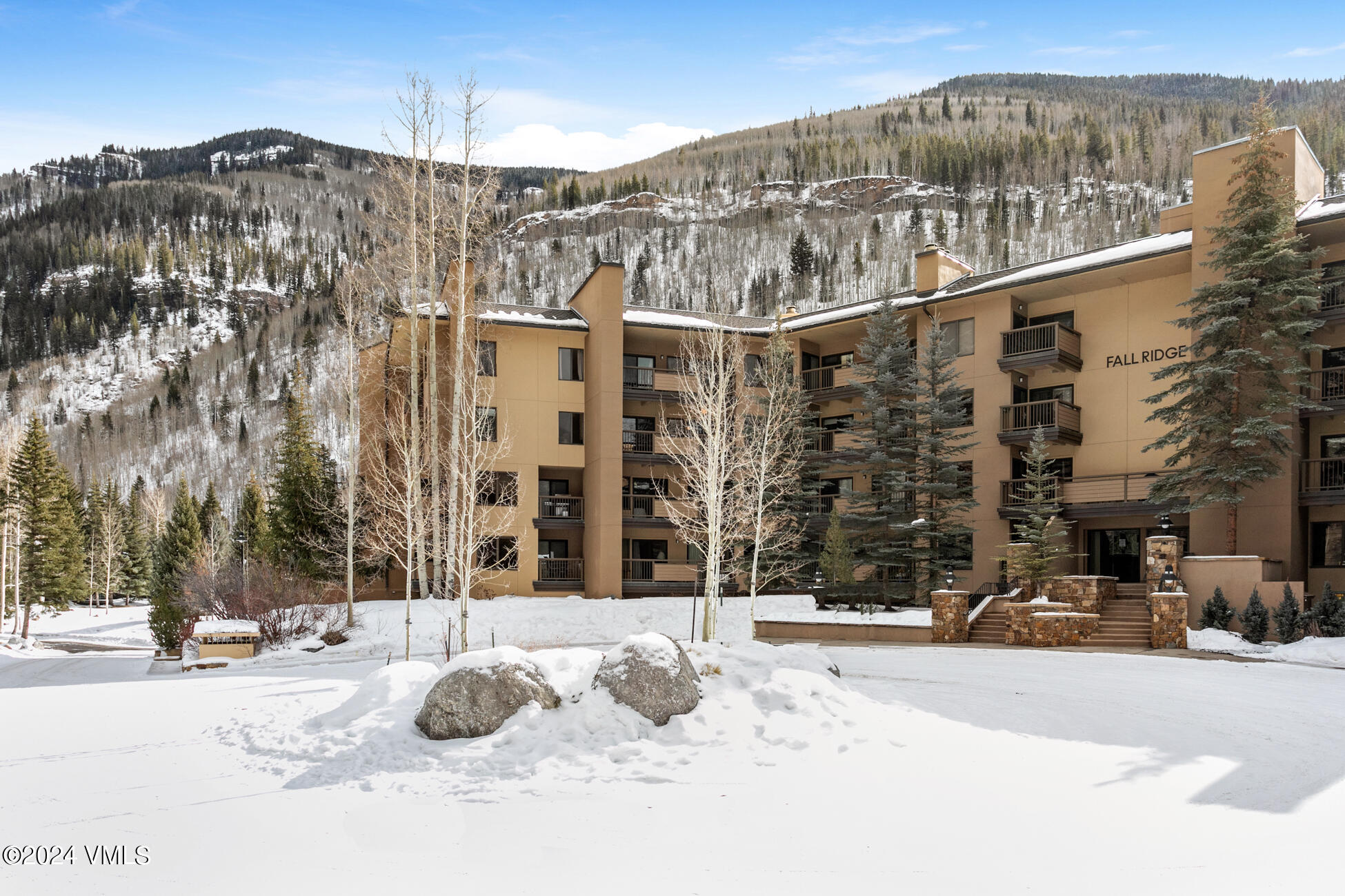 1650 Fall Ridge Road, Unit 401 Vail, CO 81657 - Photo 29 of 29 a view of a house with a snow in the background