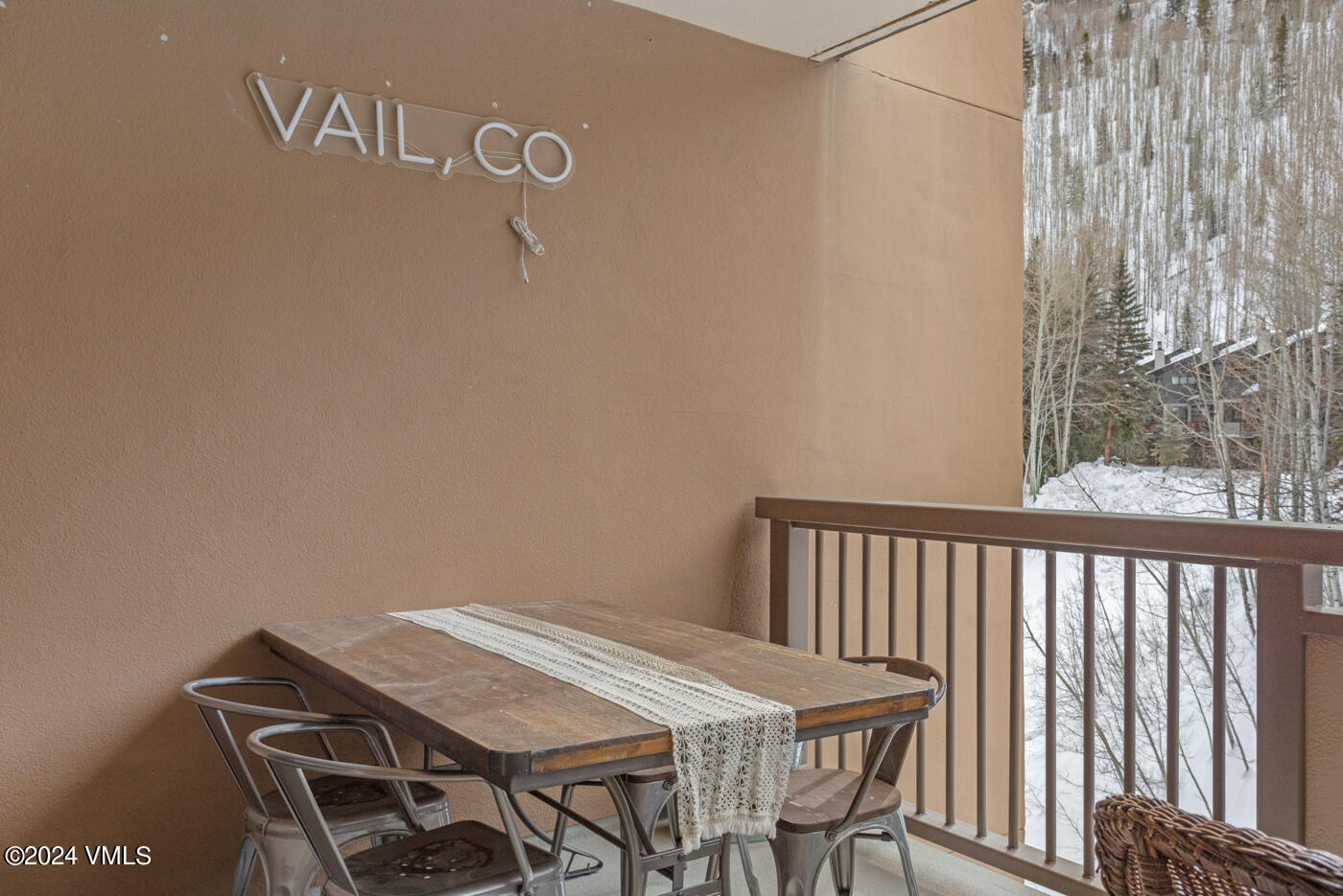1650 Fall Ridge Road, Unit 401 Vail, CO 81657 - Photo 7 of 29 a view of a room with table & chairs