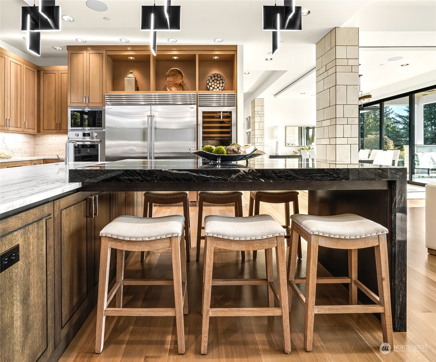 8467 Midland Road Medina, WA 98039 - Photo 19 of 40 a kitchen with a sink and chairs
