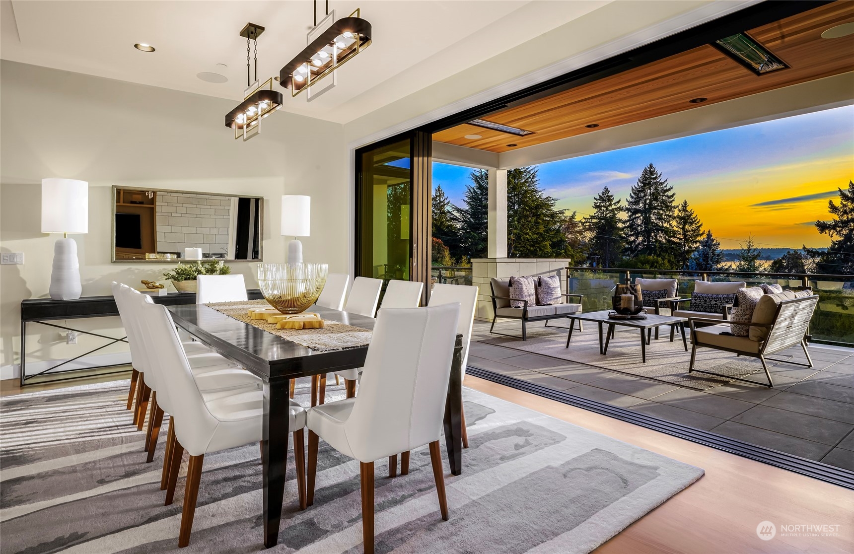 8467 Midland Road Medina, WA 98039 - Photo 20 of 40 a view of a dining room with furniture window and outside view