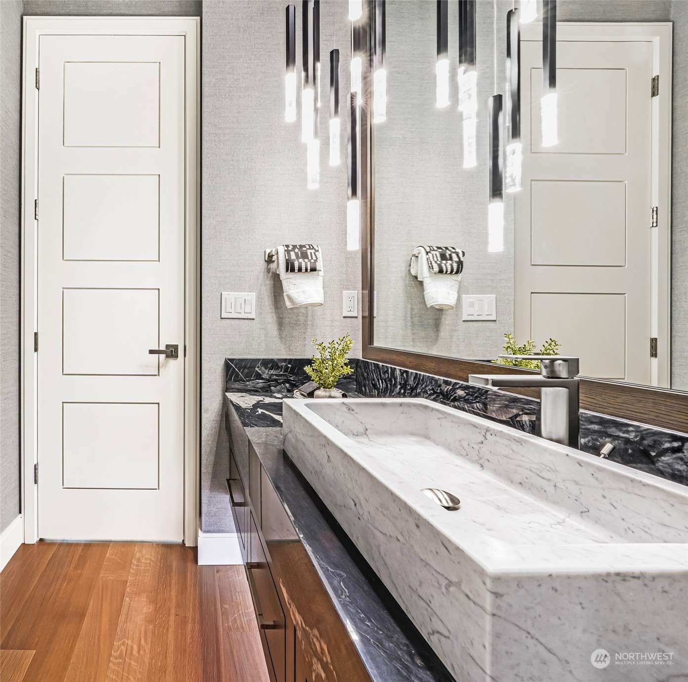 8467 Midland Road Medina, WA 98039 - Photo 24 of 40 a bathroom with a granite countertop double vanity sink a mirror and a bathtub