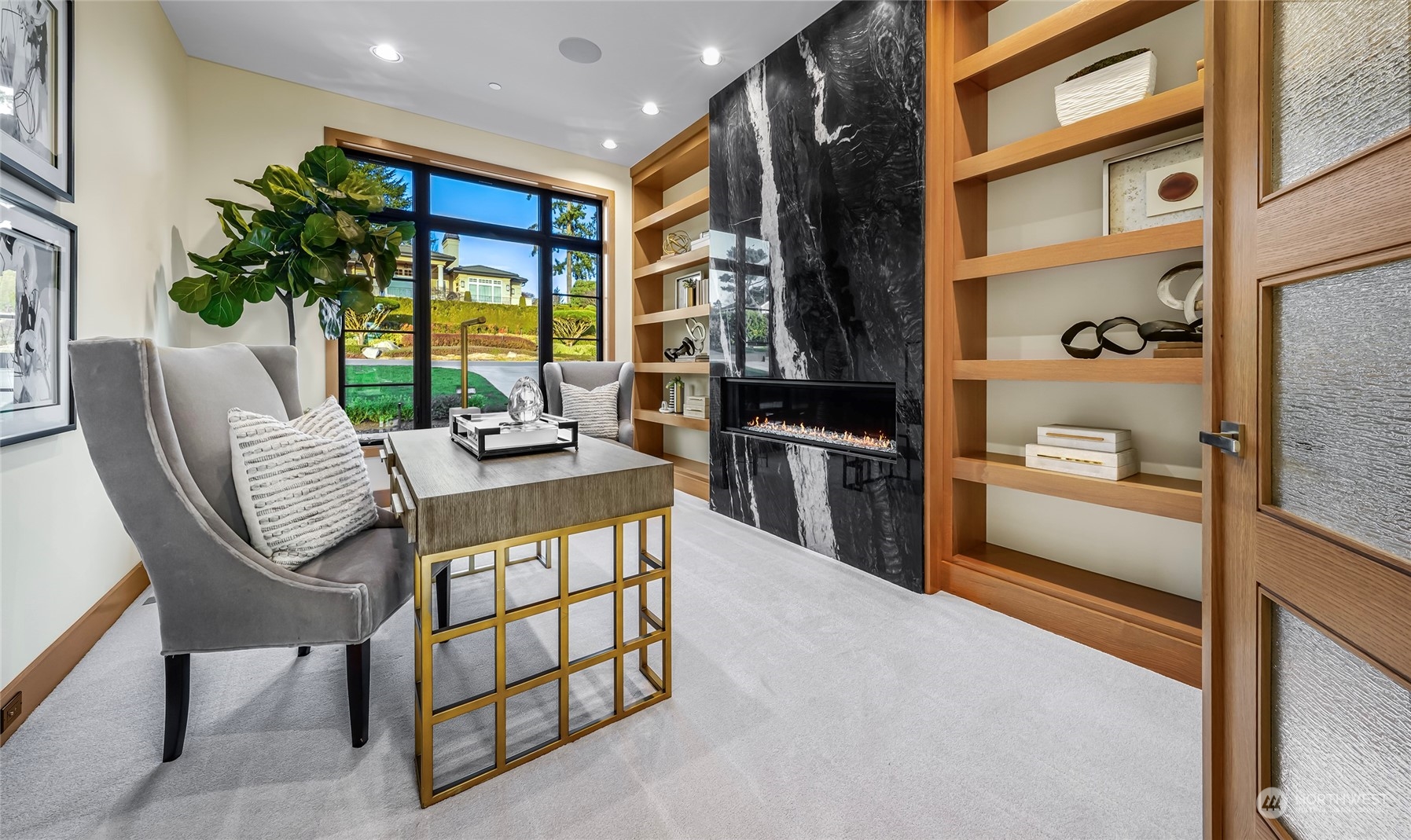 8467 Midland Road Medina, WA 98039 - Photo 25 of 40 a room with balcony furniture and a floor to ceiling window