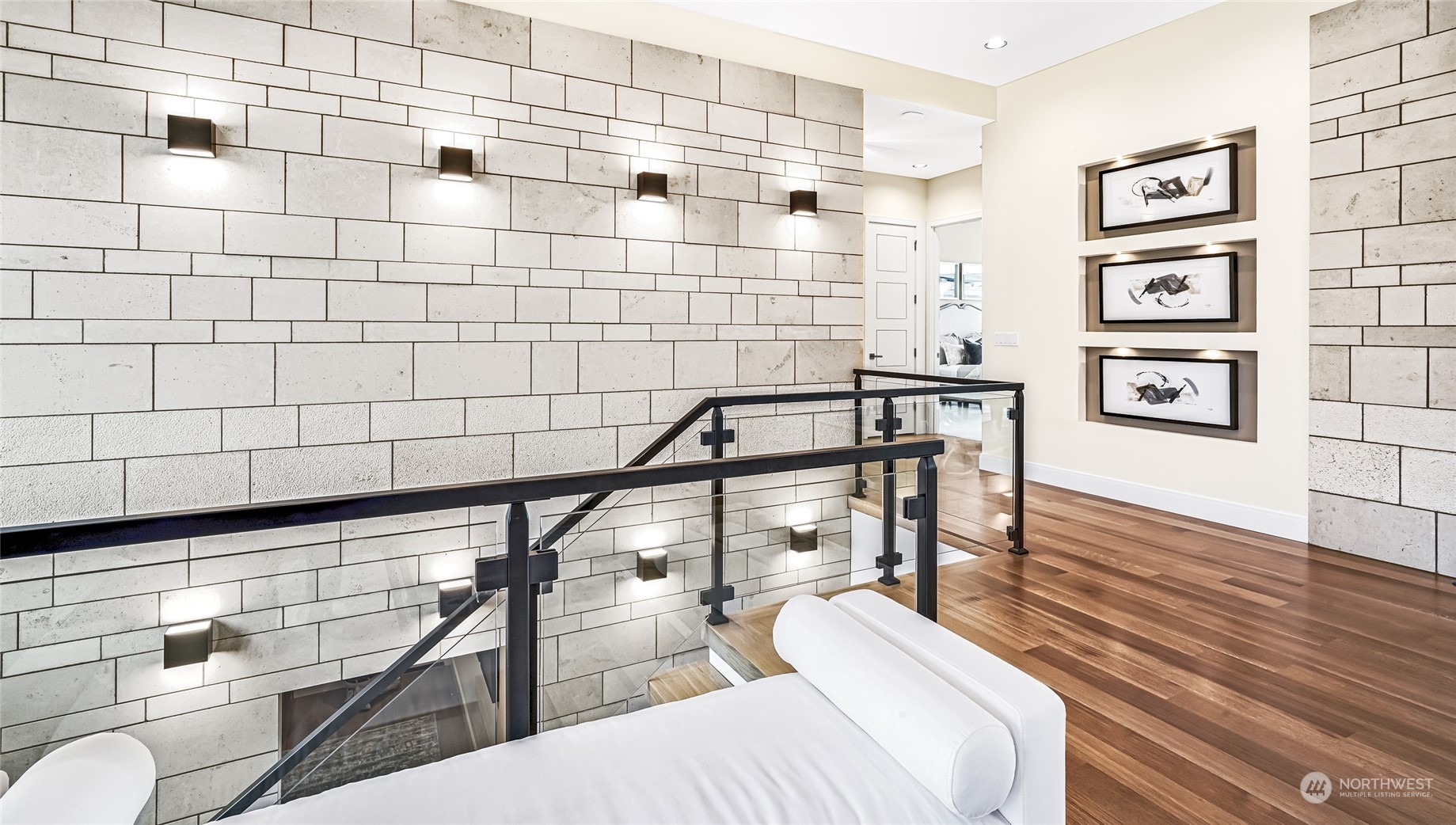 8467 Midland Road Medina, WA 98039 - Photo 33 of 40 a bedroom with furniture and wooden floor