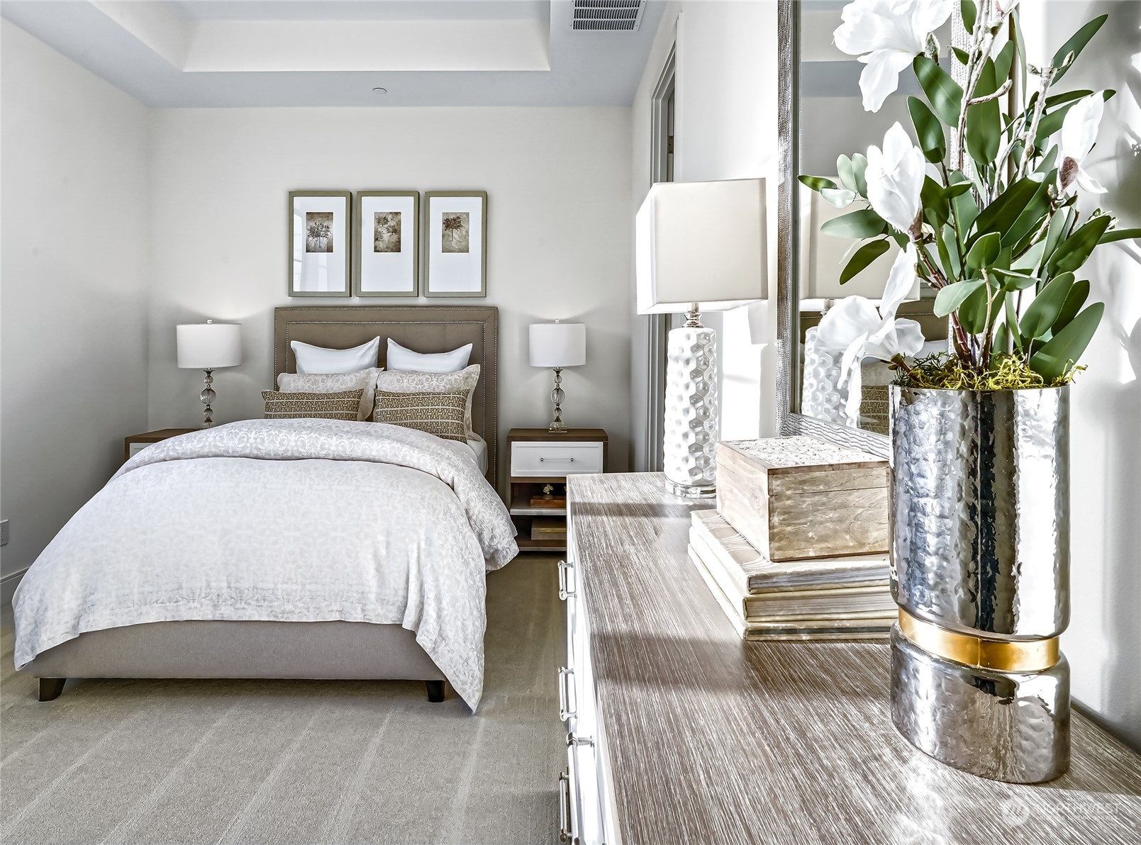 8467 Midland Road Medina, WA 98039 - Photo 38 of 40 a spacious bedroom with bed and a potted plant