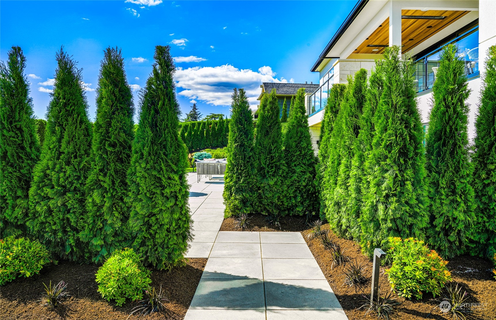 8467 Midland Road Medina, WA 98039 - Photo 7 of 40 a view of a pathway both side of the house