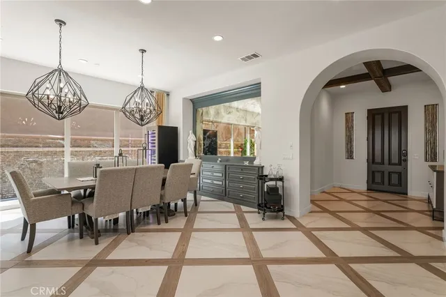 a view of a dining room with furniture