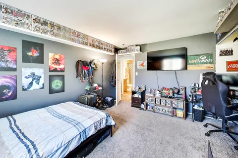 an empty room with windows and walls