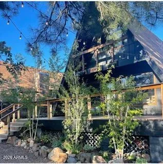 a backyard of a house with lots of green space