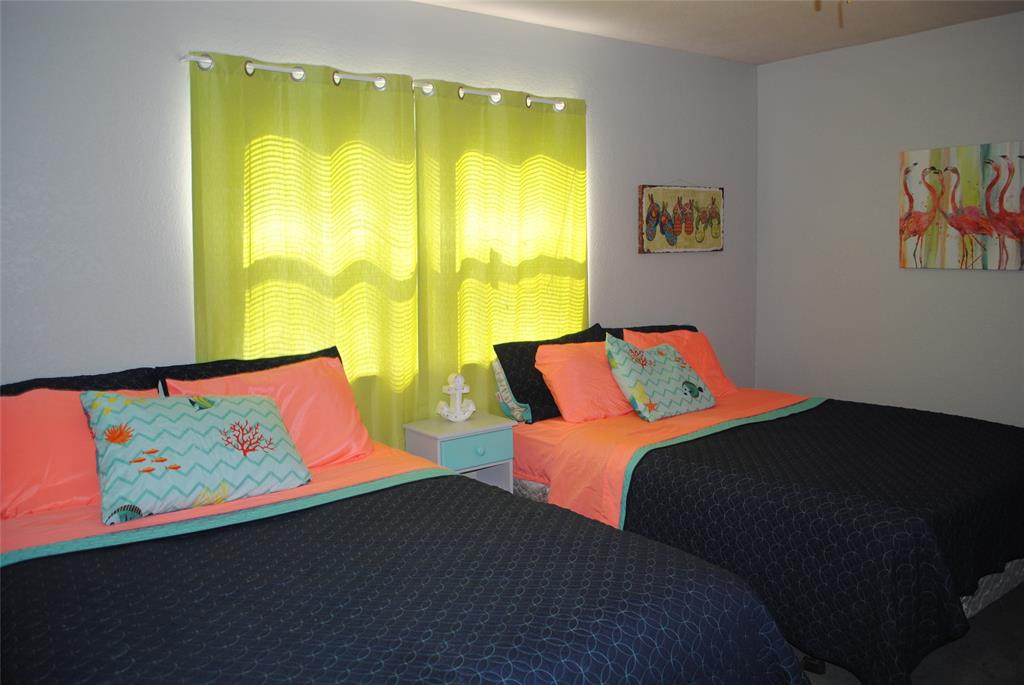 73-109 109th Goldthwaite, TX 76844 - Photo 11 of 37 a bedroom with a bed and a painting on the wall