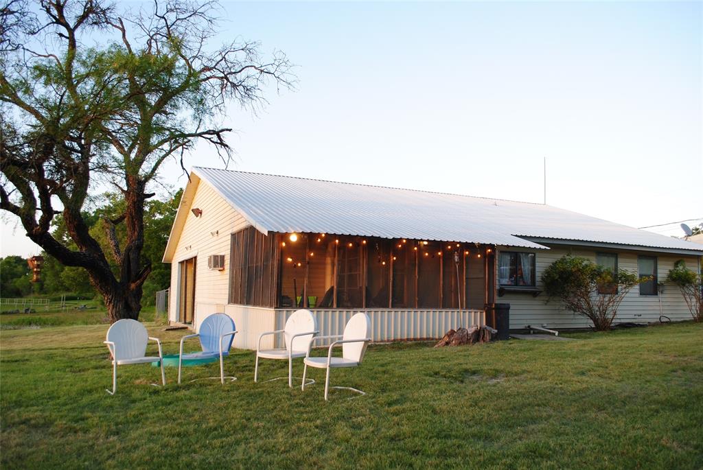 73-109 109th Goldthwaite, TX 76844 - Photo 22 of 37 a view of a house with backyard and a tree