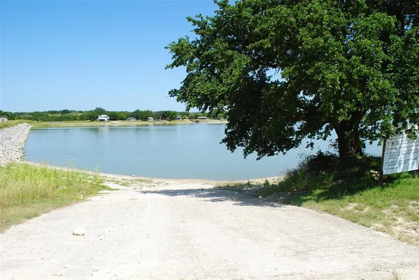 a view of a lake from a yard