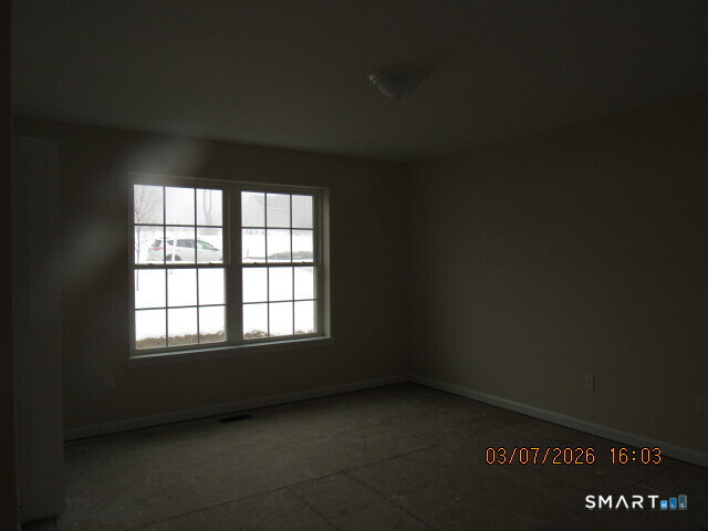 57 Warm Earth Road Naugatuck, CT 06770 - Photo 7 of 24 an empty room with a window