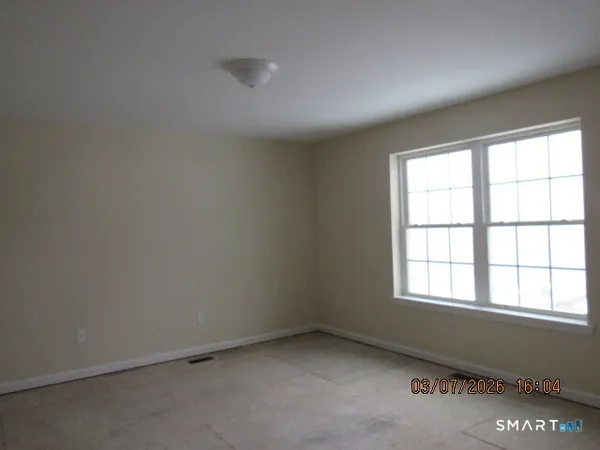 an empty room with a window