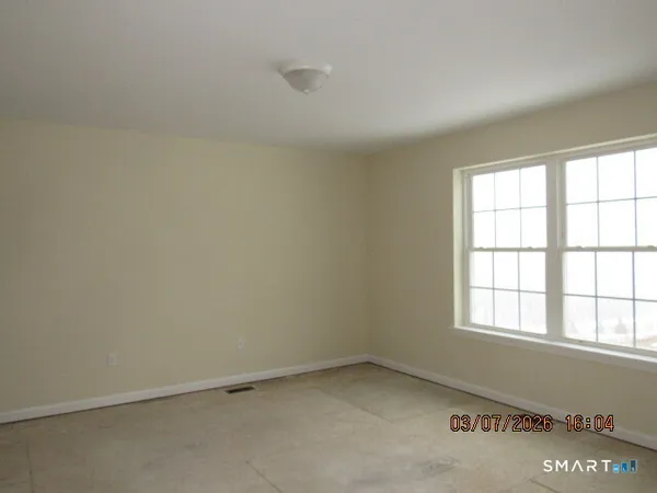 an empty room with a window