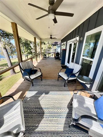 a kitchen that has a lot of cabinets in it and appliances