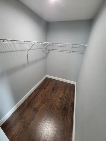 a view of a room with racks on the wall