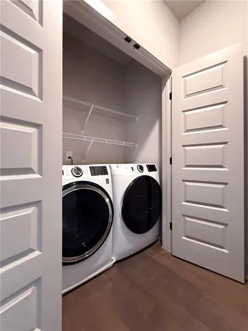 a utility room with dryer and washer