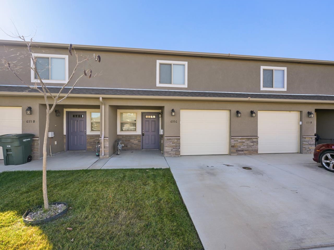 front view of a house with a yard