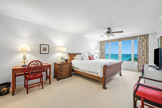 a view of balcony with two chairs and a table