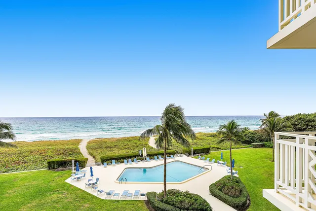 a view of swimming pool with an ocean view