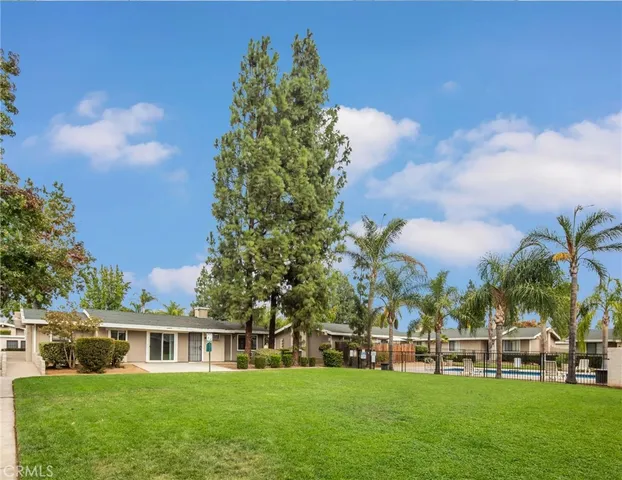 a view of swimming pool with a patio