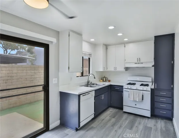 a view of an empty room with a fireplace