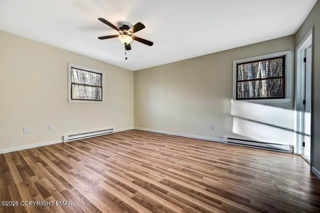 a bathroom with a sink a mirror and vanity