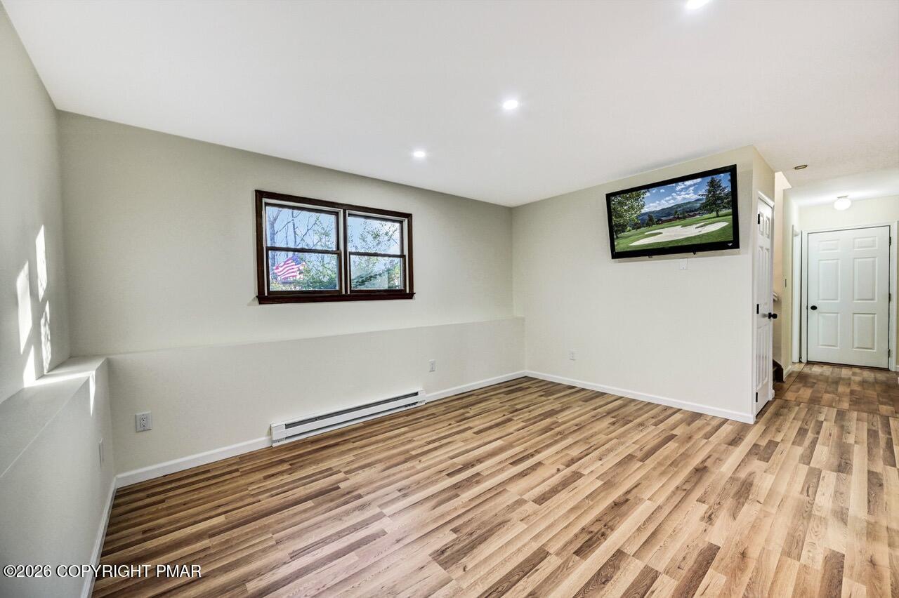 171 Foothill Boulevard Effort, PA 18330 - Photo 42 of 61 a view of a room with wooden floor and window