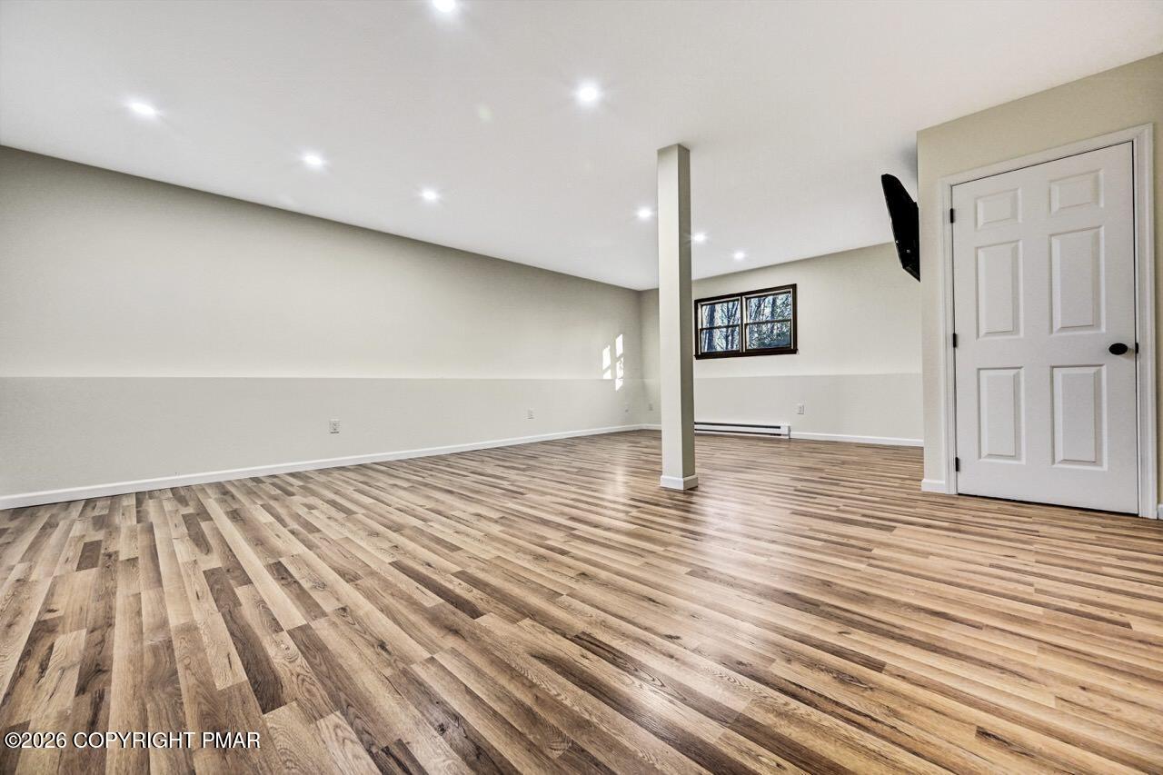 171 Foothill Boulevard Effort, PA 18330 - Photo 44 of 61 a view of an empty room with wooden floor