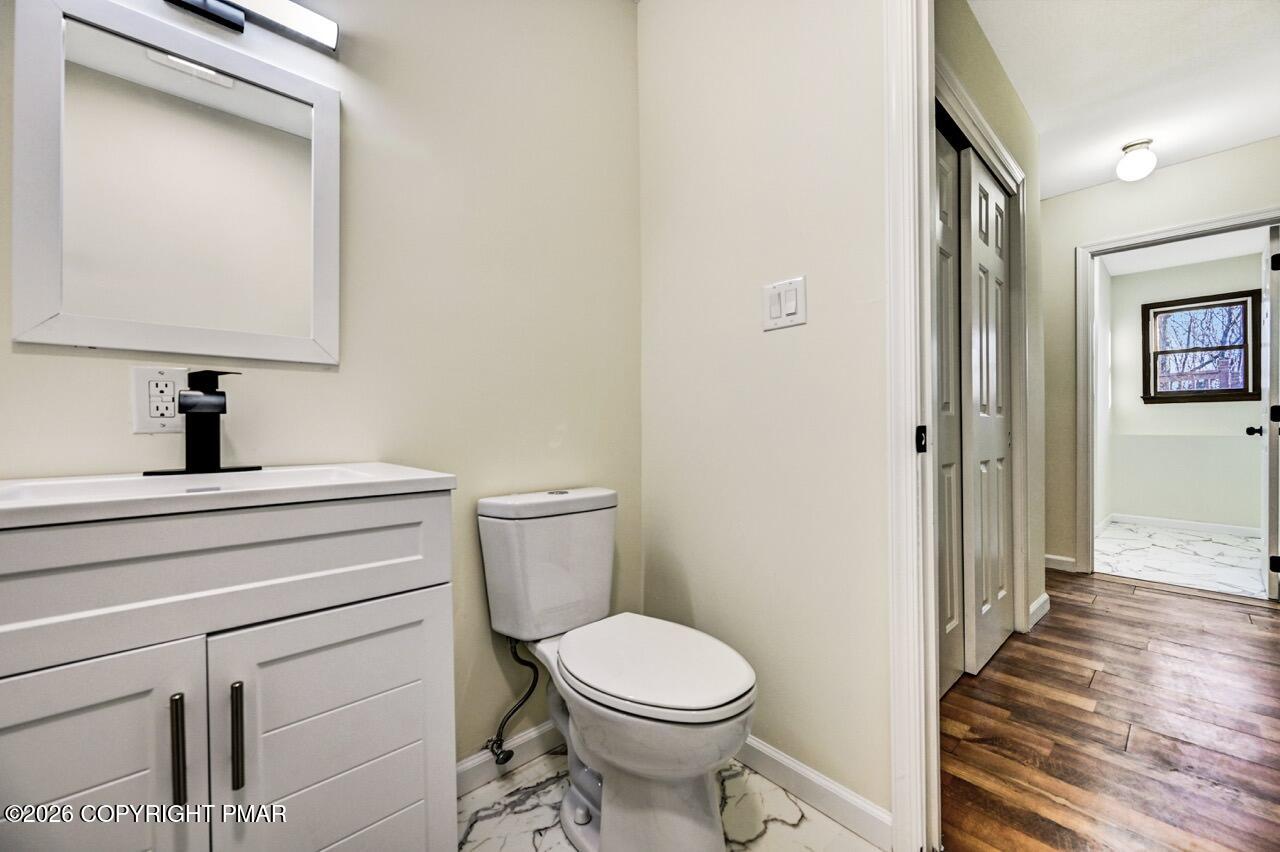 171 Foothill Boulevard Effort, PA 18330 - Photo 47 of 61 a bathroom with a toilet a sink and mirror